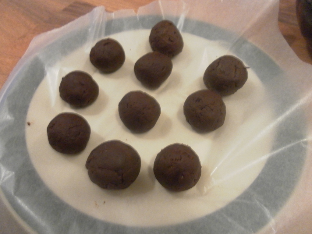 Making chocolate cream cheese truffles